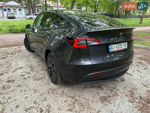 Серый Тесла Model Y, объемом двигателя 0 л и пробегом 9 тыс. км за 29990 $, фото 5 на Automoto.ua