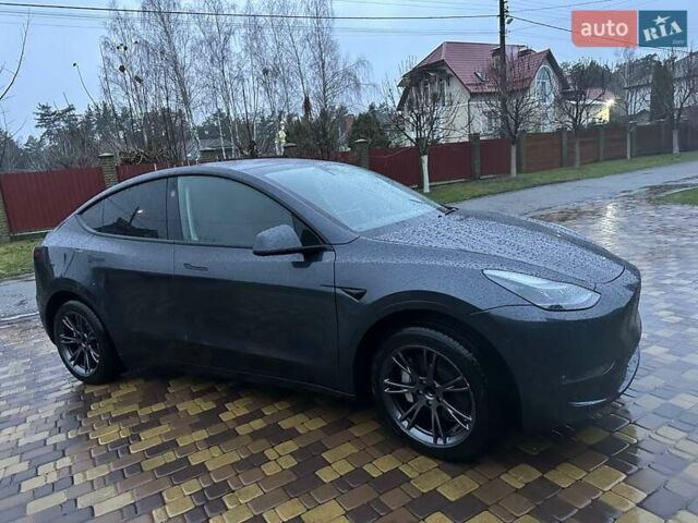 Серый Тесла Model Y, объемом двигателя 0 л и пробегом 14 тыс. км за 28200 $, фото 2 на Automoto.ua