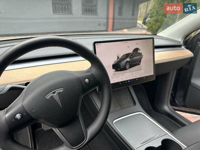 Серый Тесла Model Y, объемом двигателя 0 л и пробегом 15 тыс. км за 34500 $, фото 5 на Automoto.ua