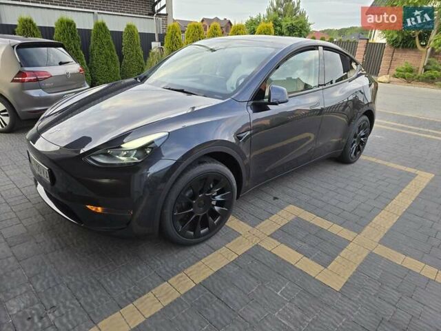 Серый Тесла Model Y, объемом двигателя 0 л и пробегом 128 тыс. км за 35700 $, фото 9 на Automoto.ua