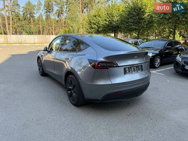 Серый Тесла Model Y, объемом двигателя 0 л и пробегом 15 тыс. км за 34999 $, фото 5 на Automoto.ua