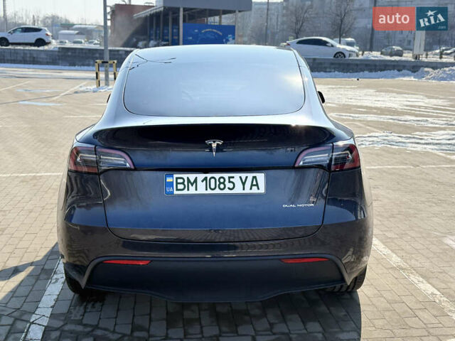 Серый Тесла Model Y, объемом двигателя 0 л и пробегом 21 тыс. км за 28900 $, фото 5 на Automoto.ua