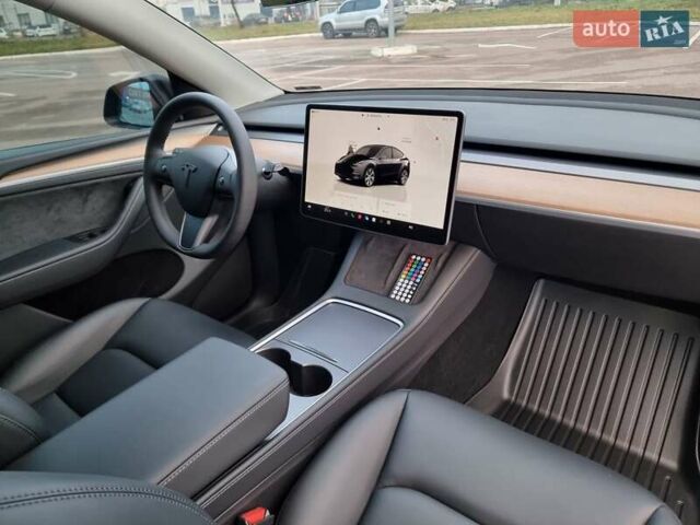 Серый Тесла Model Y, объемом двигателя 0 л и пробегом 24 тыс. км за 30900 $, фото 26 на Automoto.ua