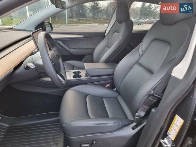 Серый Тесла Model Y, объемом двигателя 0 л и пробегом 24 тыс. км за 30900 $, фото 10 на Automoto.ua