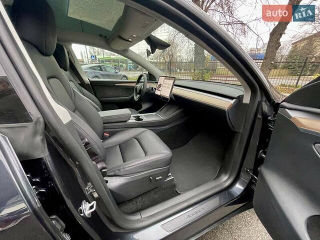 Серый Тесла Model Y, объемом двигателя 0 л и пробегом 23 тыс. км за 28800 $, фото 21 на Automoto.ua