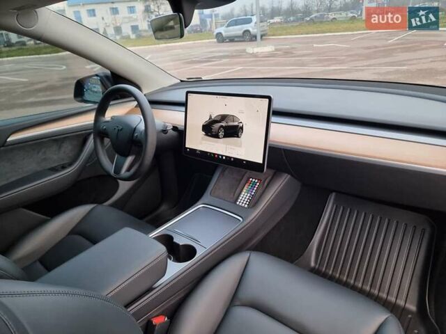 Серый Тесла Model Y, объемом двигателя 0 л и пробегом 24 тыс. км за 30900 $, фото 22 на Automoto.ua