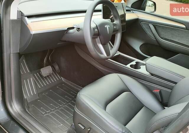 Серый Тесла Model Y, объемом двигателя 0 л и пробегом 11 тыс. км за 30599 $, фото 8 на Automoto.ua
