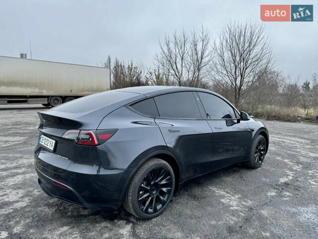 Серый Тесла Model Y, объемом двигателя 0 л и пробегом 22 тыс. км за 27000 $, фото 4 на Automoto.ua