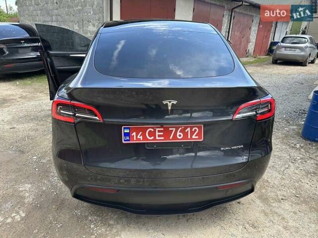Серый Тесла Model Y, объемом двигателя 0 л и пробегом 12 тыс. км за 28400 $, фото 4 на Automoto.ua