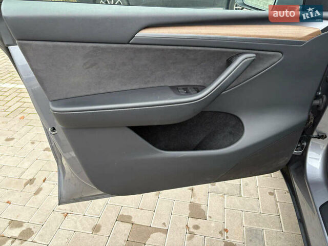 Серый Тесла Model Y, объемом двигателя 0 л и пробегом 17 тыс. км за 34300 $, фото 25 на Automoto.ua