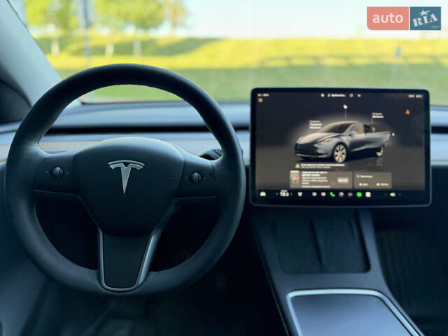 Серый Тесла Model Y, объемом двигателя 0 л и пробегом 23 тыс. км за 29800 $, фото 16 на Automoto.ua