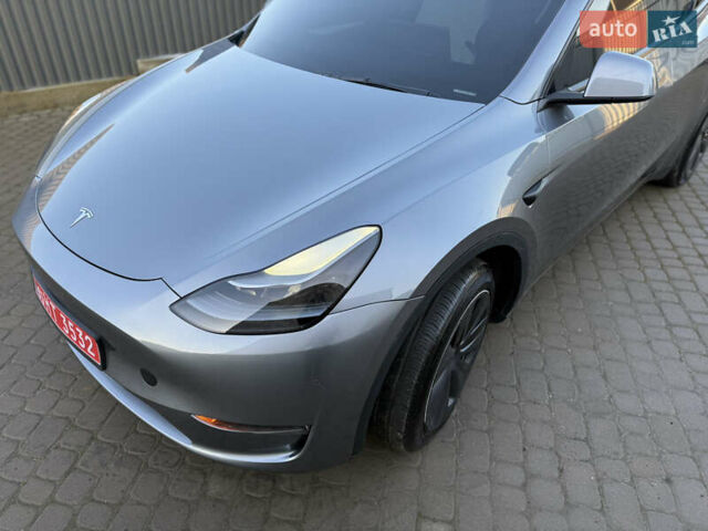 Серый Тесла Model Y, объемом двигателя 0 л и пробегом 9 тыс. км за 19800 $, фото 1 на Automoto.ua