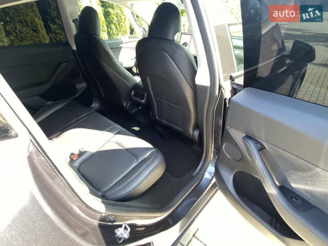 Серый Тесла Model Y, объемом двигателя 0 л и пробегом 13 тыс. км за 29700 $, фото 6 на Automoto.ua