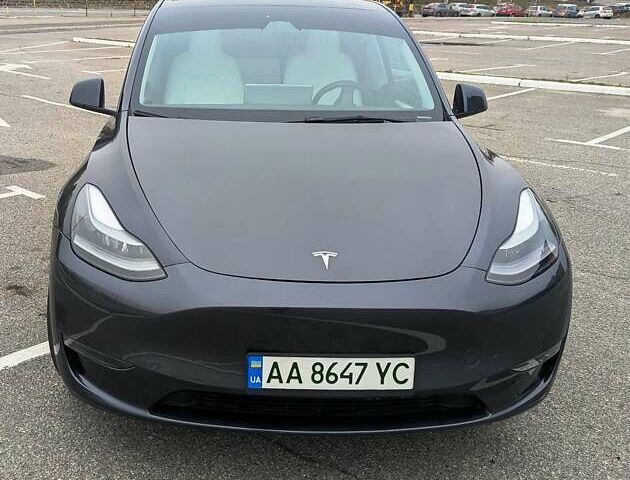 Серый Тесла Model Y, объемом двигателя 0 л и пробегом 13 тыс. км за 29900 $, фото 1 на Automoto.ua