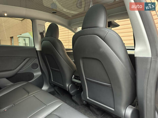 Серый Тесла Model Y, объемом двигателя 0 л и пробегом 2 тыс. км за 35490 $, фото 36 на Automoto.ua