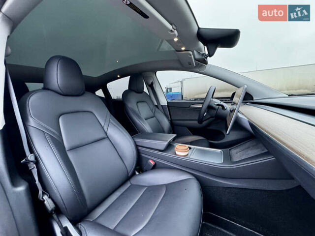 Серый Тесла Model Y, объемом двигателя 0 л и пробегом 22 тыс. км за 27000 $, фото 13 на Automoto.ua