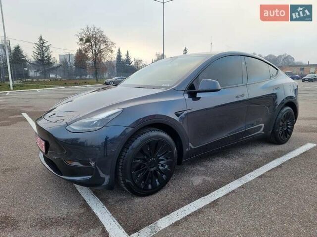 Серый Тесла Model Y, объемом двигателя 0 л и пробегом 24 тыс. км за 30900 $, фото 2 на Automoto.ua