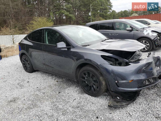 Серый Тесла Model Y, объемом двигателя 0 л и пробегом 7 тыс. км за 19990 $, фото 2 на Automoto.ua