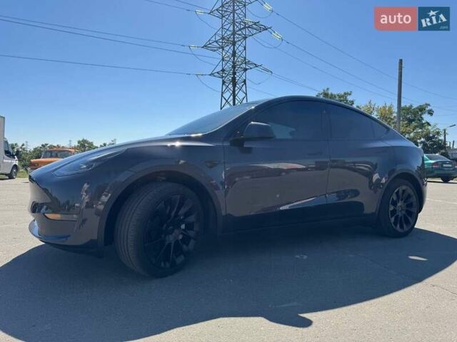 Серый Тесла Model Y, объемом двигателя 0 л и пробегом 22 тыс. км за 30900 $, фото 2 на Automoto.ua