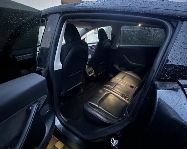 Серый Тесла Model Y, объемом двигателя 0 л и пробегом 14 тыс. км за 28200 $, фото 9 на Automoto.ua