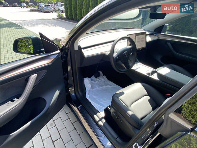 Серый Тесла Model Y, объемом двигателя 0 л и пробегом 13 тыс. км за 29700 $, фото 7 на Automoto.ua
