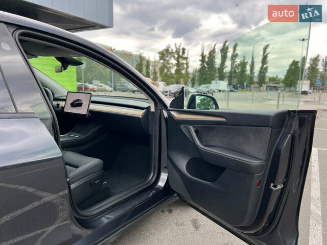 Серый Тесла Model Y, объемом двигателя 0 л и пробегом 13 тыс. км за 32999 $, фото 30 на Automoto.ua