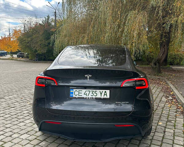 Серый Тесла Model Y, объемом двигателя 0 л и пробегом 26 тыс. км за 31700 $, фото 2 на Automoto.ua