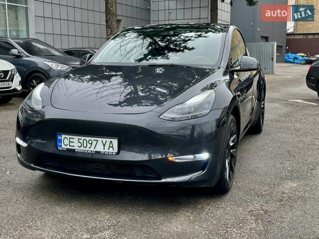 Серый Тесла Model Y, объемом двигателя 0 л и пробегом 23 тыс. км за 28800 $, фото 1 на Automoto.ua