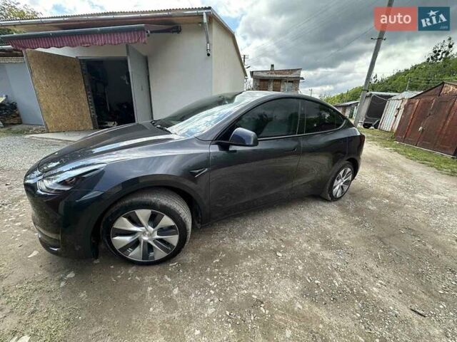 Серый Тесла Model Y, объемом двигателя 0 л и пробегом 12 тыс. км за 28400 $, фото 3 на Automoto.ua