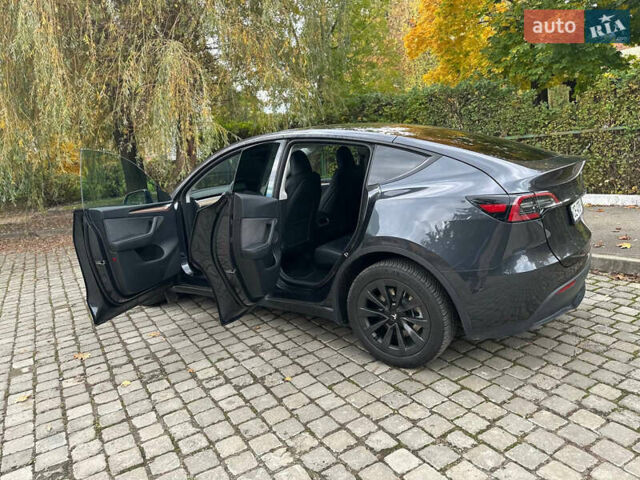 Серый Тесла Model Y, объемом двигателя 0 л и пробегом 26 тыс. км за 31700 $, фото 13 на Automoto.ua