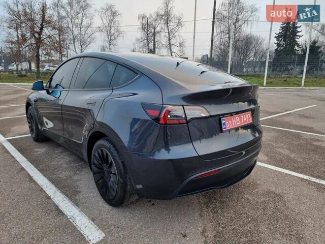 Серый Тесла Model Y, объемом двигателя 0 л и пробегом 24 тыс. км за 30900 $, фото 4 на Automoto.ua