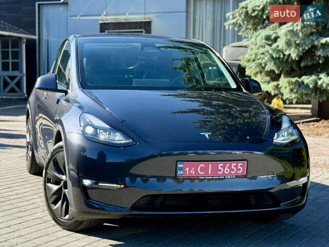 Серый Тесла Model Y, объемом двигателя 0 л и пробегом 12 тыс. км за 29500 $, фото 1 на Automoto.ua