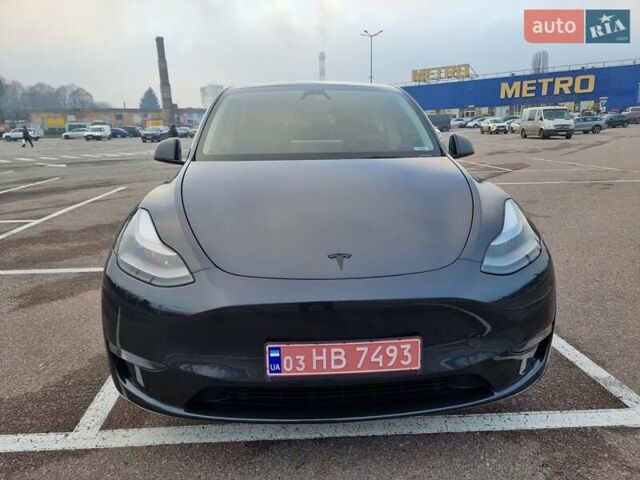 Серый Тесла Model Y, объемом двигателя 0 л и пробегом 24 тыс. км за 30900 $, фото 1 на Automoto.ua