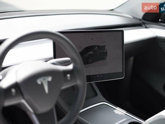 Серый Тесла Model Y, объемом двигателя 0 л и пробегом 24 тыс. км за 29500 $, фото 38 на Automoto.ua