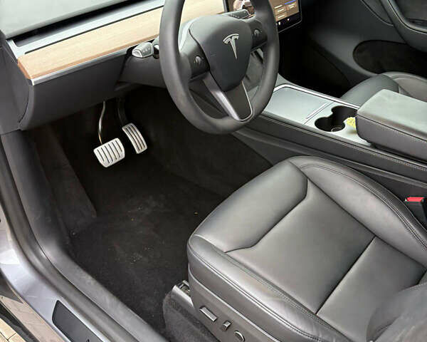 Серый Тесла Model Y, объемом двигателя 0 л и пробегом 17 тыс. км за 34300 $, фото 20 на Automoto.ua
