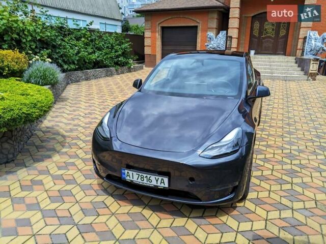 Серый Тесла Model Y, объемом двигателя 0 л и пробегом 16 тыс. км за 26200 $, фото 3 на Automoto.ua