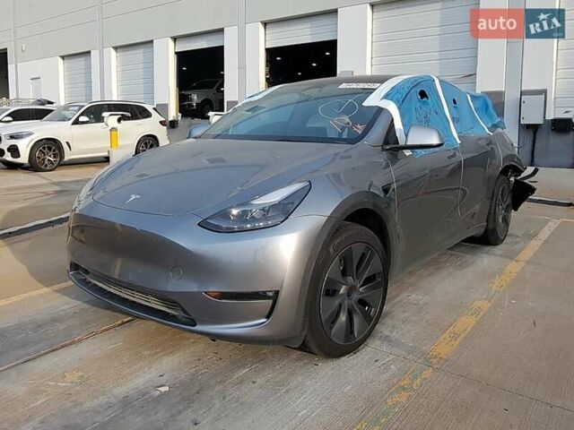 Серый Тесла Model Y, объемом двигателя 0 л и пробегом 26 тыс. км за 21800 $, фото 25 на Automoto.ua