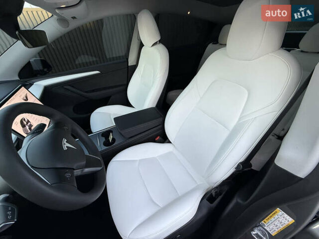 Серый Тесла Model Y, объемом двигателя 0 л и пробегом 9 тыс. км за 19800 $, фото 23 на Automoto.ua