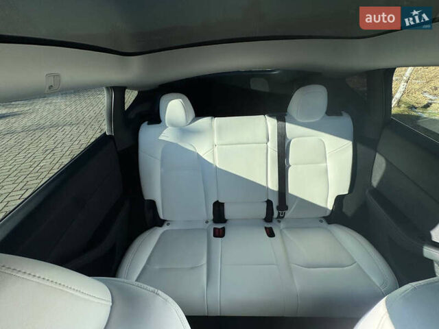 Серый Тесла Model Y, объемом двигателя 0 л и пробегом 9 тыс. км за 29500 $, фото 128 на Automoto.ua