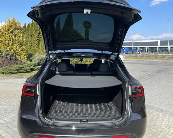 Серый Тесла Model Y, объемом двигателя 0 л и пробегом 22 тыс. км за 34700 $, фото 36 на Automoto.ua