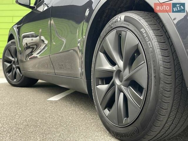 Серый Тесла Model Y, объемом двигателя 0 л и пробегом 22 тыс. км за 34700 $, фото 16 на Automoto.ua