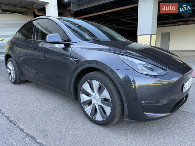 Серый Тесла Model Y, объемом двигателя 0 л и пробегом 23 тыс. км за 29800 $, фото 5 на Automoto.ua