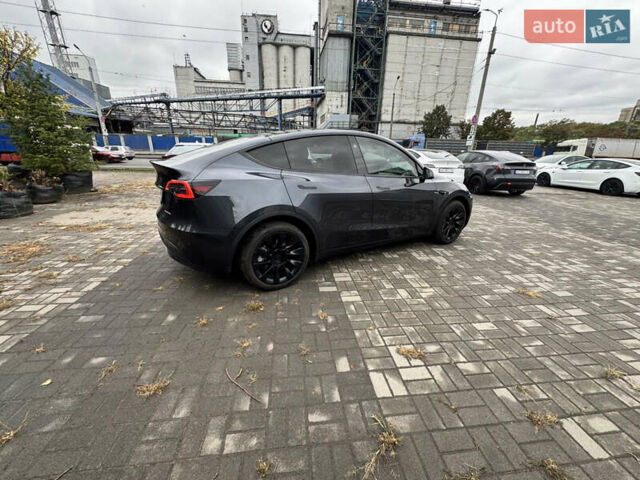 Серый Тесла Model Y, объемом двигателя 0 л и пробегом 8 тыс. км за 31999 $, фото 8 на Automoto.ua