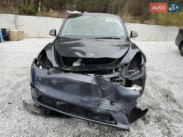 Серый Тесла Model Y, объемом двигателя 0 л и пробегом 7 тыс. км за 19990 $, фото 3 на Automoto.ua