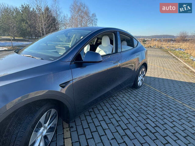 Серый Тесла Model Y, объемом двигателя 0 л и пробегом 9 тыс. км за 29500 $, фото 1 на Automoto.ua