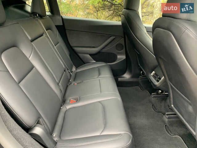 Серый Тесла Model Y, объемом двигателя 0 л и пробегом 14 тыс. км за 32300 $, фото 18 на Automoto.ua