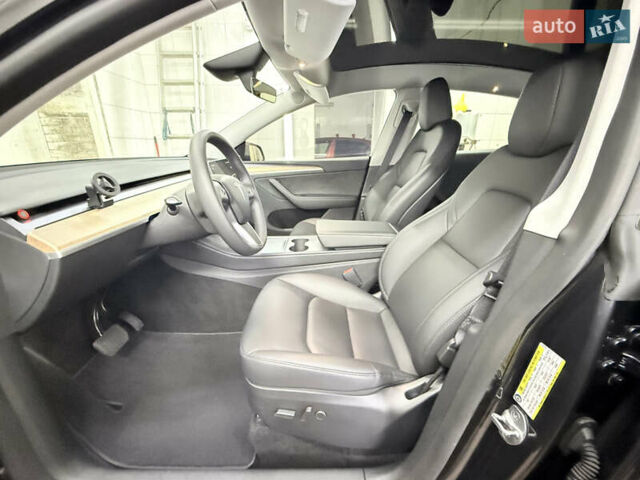 Серый Тесла Model Y, объемом двигателя 0 л и пробегом 21 тыс. км за 28900 $, фото 32 на Automoto.ua