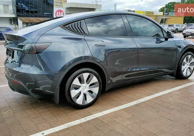 Серый Тесла Model Y, объемом двигателя 0 л и пробегом 11 тыс. км за 30599 $, фото 10 на Automoto.ua