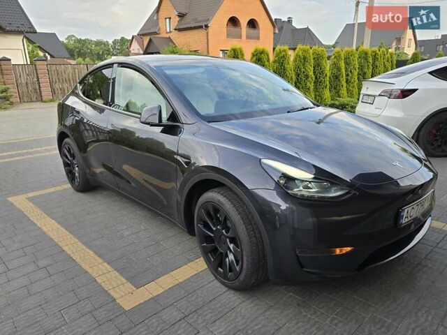 Серый Тесла Model Y, объемом двигателя 0 л и пробегом 128 тыс. км за 35700 $, фото 5 на Automoto.ua