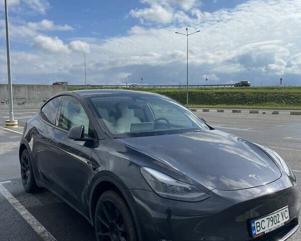 Серый Тесла Model Y, объемом двигателя 0 л и пробегом 20 тыс. км за 25000 $, фото 2 на Automoto.ua